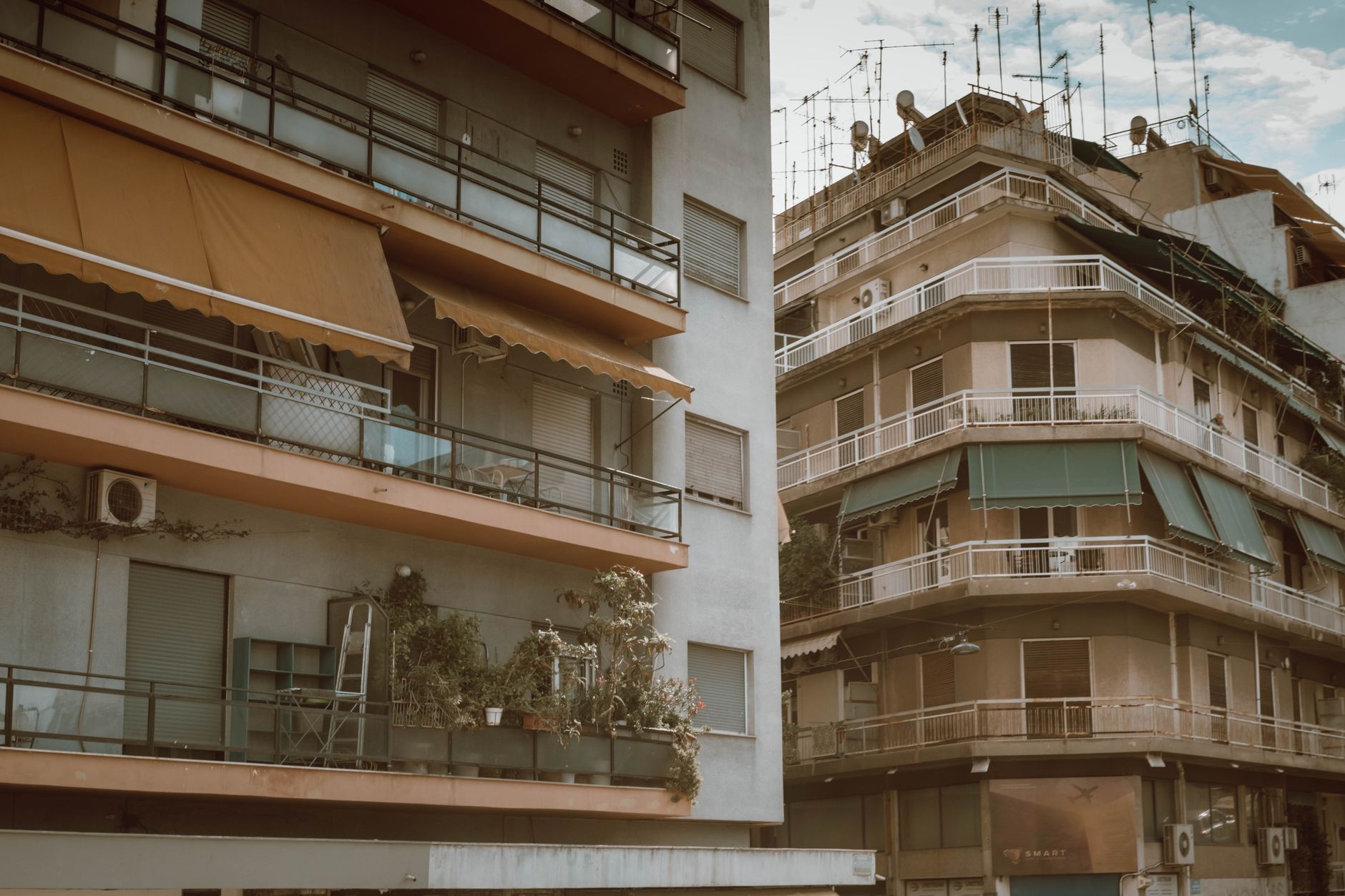 Urban apartment buildings heatwave Athens